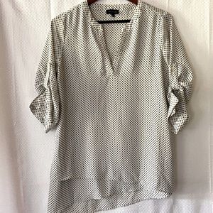Polka dot asymmetrical hem top